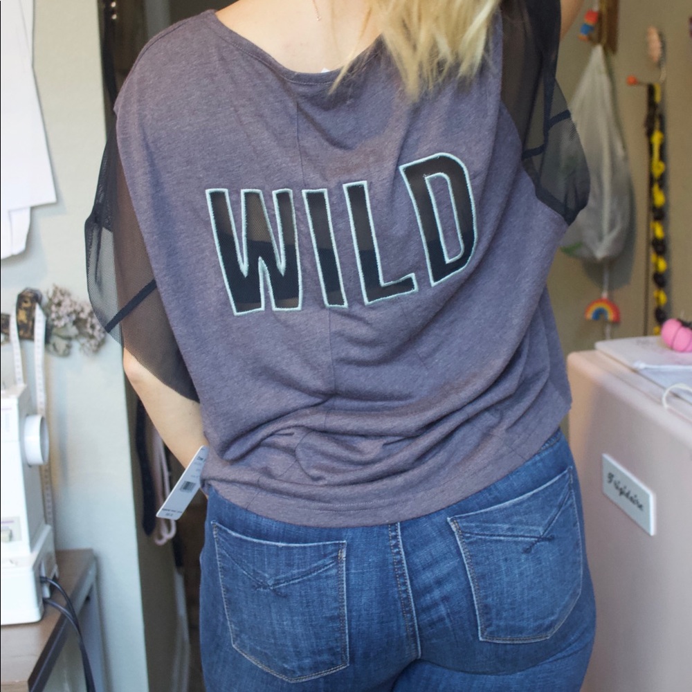 NWT Free People Movement WILD mesh graphic top